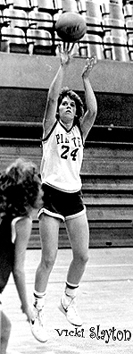 Vicki Slaton, Fayetteville (W.Va.) High School basketball player, #24, shooting a jump shot in the day.