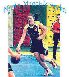 Marta Marcinkowska, dribbling the ball up the court.