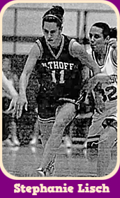 Image of Missori girls basketball playe on Althoff High, dribbling the ball around defender, in white on black ALTHOFF uniform, #11. From the St. Louis Post-Dispatch, December 22, 2001. Cropped from large photo by Fred Wilk.