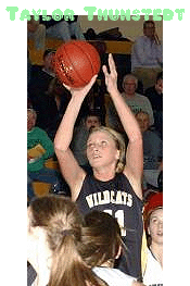 Taylor Thunstedt, New London-Spicer High School Wildcat girls basketball player (Minnesota), Number 11 shooting the ball.