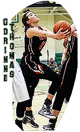 Image of Corinne Thomas, Tecumsseh High Arrows girls basketball player, going up for a lay-up.