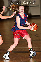 Danielle Angley, Sturt Sabres #10, with ball in action shot.