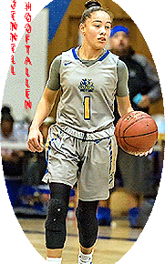 Jennell Hooftallen, girls basketball player for San Diego's Mira Mesa High School (California), dribbbling ball in light grey uniform with big yellow #1 on front.