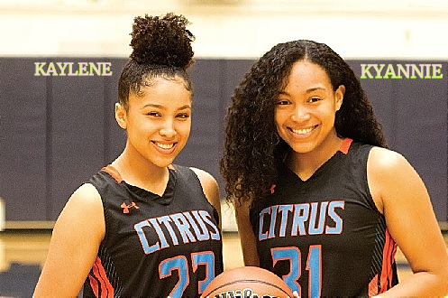 Image of sisters Kaylene Brown (on the left of picture) and Kyannie Brown, posing in their Citrus uniforms. Kaylene, number 23 and Kyannie, number 31 (right)