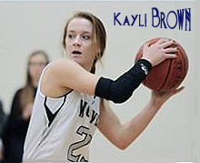Image of Kayli Brown, Living Word Lutheran Academy (Wisconsin) girls basketball player, number 23, looking to pass the basketball.