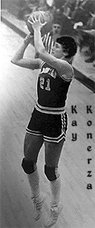 Black and white image of Kay Konerza, girls basketball player at Lester Prairie HS, Minnesota. Number 21, shooting a jump shot.