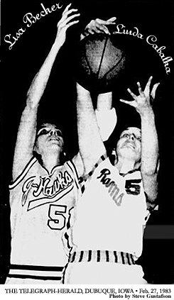 Phpt of game action of Lisa Becker, Cedar Rapids Jefferson J-Hawks basketball player, in February 25, 1983 Regional championship game in which she scored 71 points, in 81 to 77 loss to the Senior High Rams of Dubuque. Photo shows Becker going up for a rebound against Linda Cabalka of the Rams. From The Telegraph-Herald, Dubuque, Iowa, February 27, 1983. Photo by Steve Gustafson.