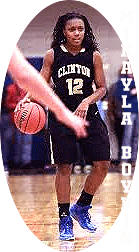 Mikayla Boynton, Clinton High School (North Carolina) girls basketball player, in a game, coming upcourt, black uniform, number 12.