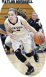 Image of Taylor Mikesell, girls basketball player for Ohio Massillon Jackson High School, drobbling ball upcourt in white uniform.