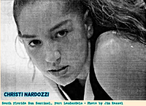 Image of Christi Nardozzi, girls basketball player on the Royal Palm Beach High School team (Florida), portrait, leaning to our left, sweating. From the South Florida Sun Sentinel, Fort Lauderdale, Florida, December 4, 2004. Photo by Jim Rassol.