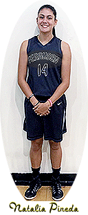 Full length portrait of Natalia Pineda, girls high school player on Ferguson High, posing with hands clasped at waist. In green uniform, #14.