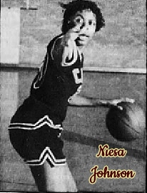 Image of girls basketball player for Clinton High School (Jackson, Mississipppi) 'directing teaffic' pointing in our direction. From The Clarion-Ledger, Jackson, Mississippi, November 21, 1990..