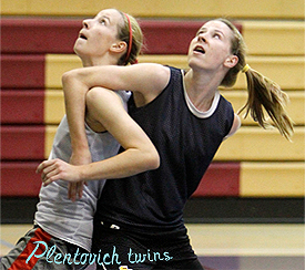 Plentovich twins, basketball players, one guarding the other.
