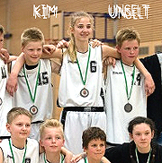 Portion of team photo, showing Kim Unselt, surrounded by much shorter boys teammates.