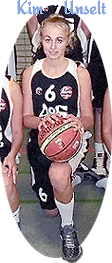 Kim Unselt (from team photo), number 6, leaning, with basketball on knee.