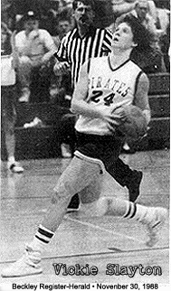 Black and White image of Vickie Slayton, Fayetteville High School (West Virginia) girls basketball player, in white PIRATEs uniform, #24. From the Beckley Register-Herald, November 30, 1988