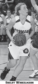 Photo of Shelby Winkelmann, Hermann High Lady Bearcats basketball player, about to score two of her 55 points in the Class 3, District 9 Tournament Championship GAme, in an 85 to 36 win over Fatima High, March 6, 2009.