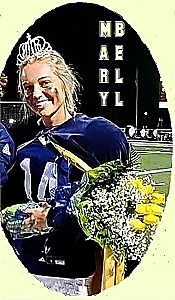 Image of female football playeer Mary Bell, Elizabethtown High School Panther kicker and homecoming queen, shown with tiara and roses, in blue uniform #14..