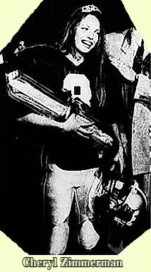 Black and white image o Cheryl Zimmerman, West Potomac High School, D.C.-Virginia, homecoming queen an football place kicker, shown, in uniform #8, holding helmet, with flower bouquet and crown. From The Anniston Star, Anniston, Alibama, October 17, 1993.