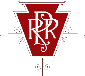 Pennsylvania Railroad keystone with intertwined PRR in art nouveau style, tungsten red background.