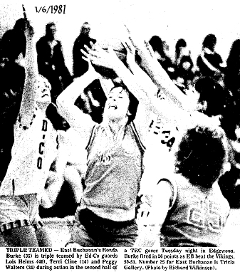 Phot titled Triple Teamed, from Oelwein (Ia.) Daily Register, January 7, 1981, of a Iowa girls 6-on-6, 2 court basketball game, on 1/6/1981, between East Buchanan High and the Edgewood-Colesburg Vikings, final score, EB 59 - Ed-Co 51. Second half action is shown; the Bucs' Ronda Burke, number 35, has the ball and is triple teamed by Ed-Co guards, Lois Helms, on the left, Terri Cline, center, and Peggy Walters, number 34 on right, with EB's Tricia Gallery, number 25 in lower right of picture. Burke would score 26 points in the game.
