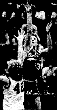 Picture of Shanda Berry, Oelwein Huskette girls basketball player, shooting over Waverly High School's Janelle Jaspers, number 42, in the regional semifinal at Cedar Falls, February 21, 1984, in a 83-75 victory. Berry scored 39 points in the game. Photo by Tom Franklin, from The Register, Oelwein, Iowa, 2/22/1984.