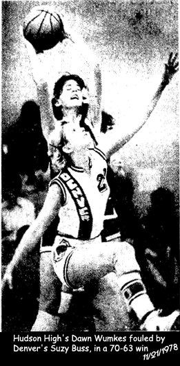 Photo by Gary Fandel, from the Waterloo Courier, Waterloo, Iowa, November 22, 1978, of Hudson High School basketball team's Dawn Wumkes being fouled by Denver High's Suzy Buss in an Iowa 6-on-6 basketball game on 11/21/1978, which Hudson won 70 to 63. Wumkes scored 27 points in this game. She would score 64 points in a game the next season, against Ackley-Geneva, 2/12/1980.